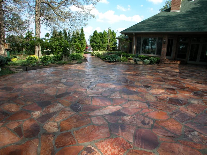 Red slate pavers on a residential driveway